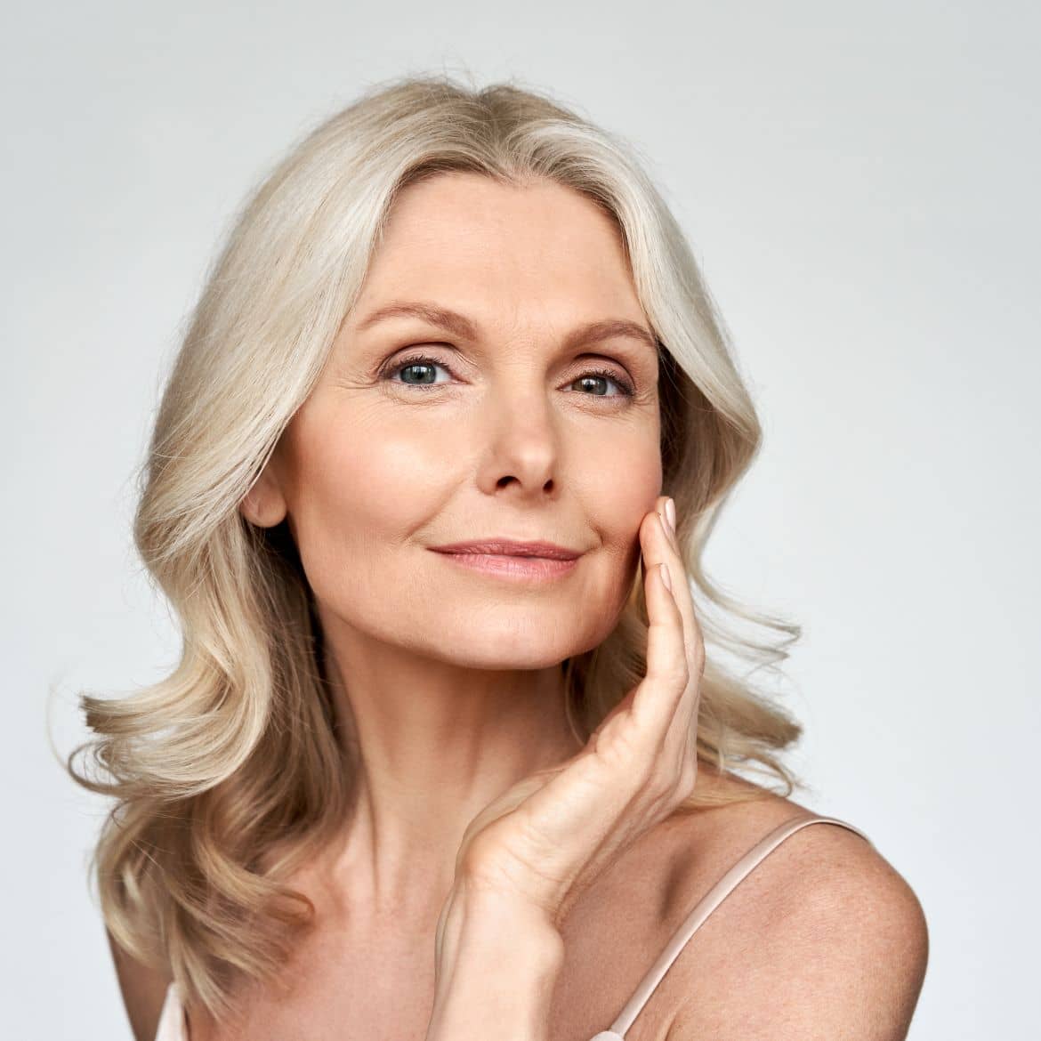 Image of a middle age woman with a radiant skin.